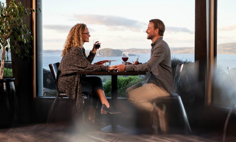 Skyline Rotorua Stratosfare A Couple Holding Hands At Dinner